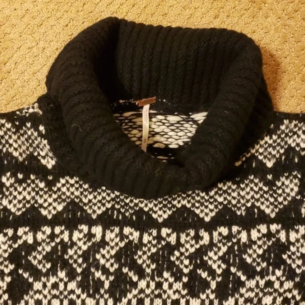 Free people  turtleneck sweater size medium.